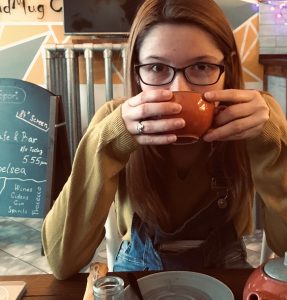 Amy drinking tea