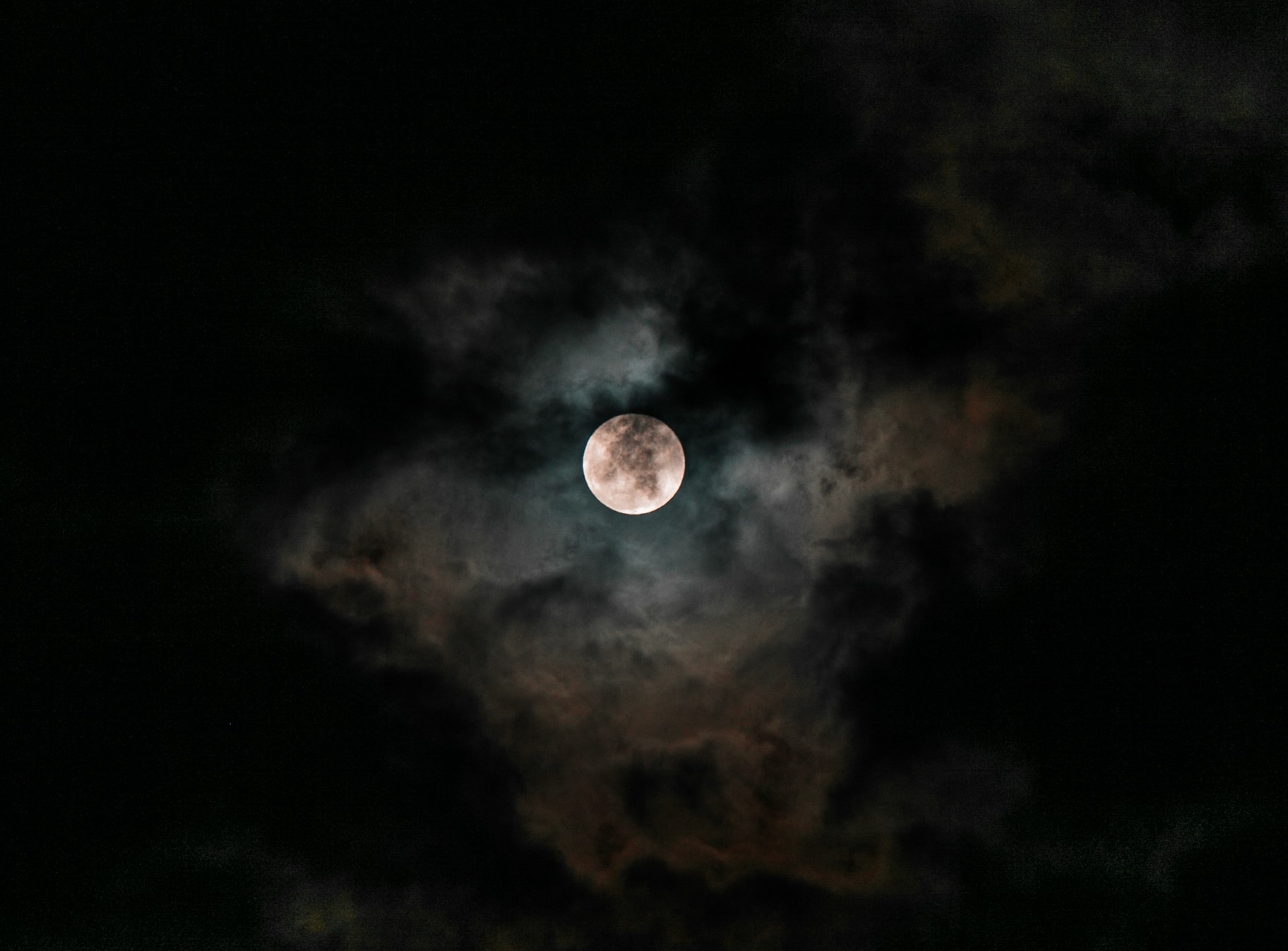 full moon in the clouds